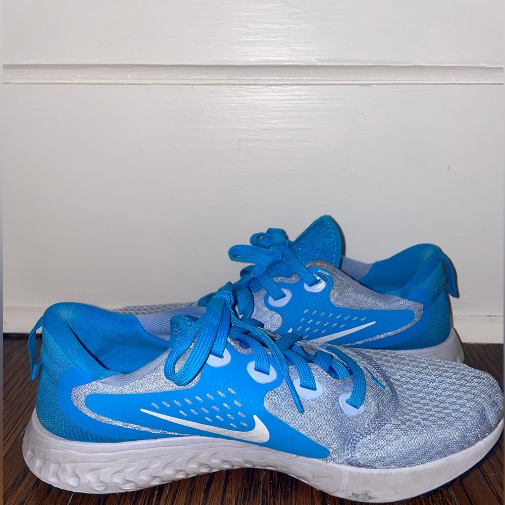 blue Nike running sneakers, women’s size 8